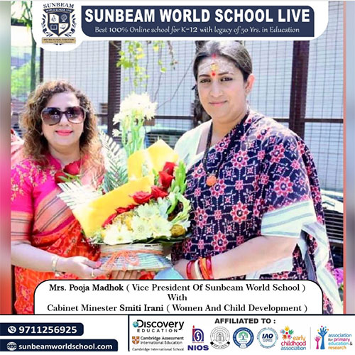 Honorable Mrs. Pooja Madhok, Vice president of Sunbeam World School, in a meaningful exchange with Honorable Cabinet Minister Smriti Irani.